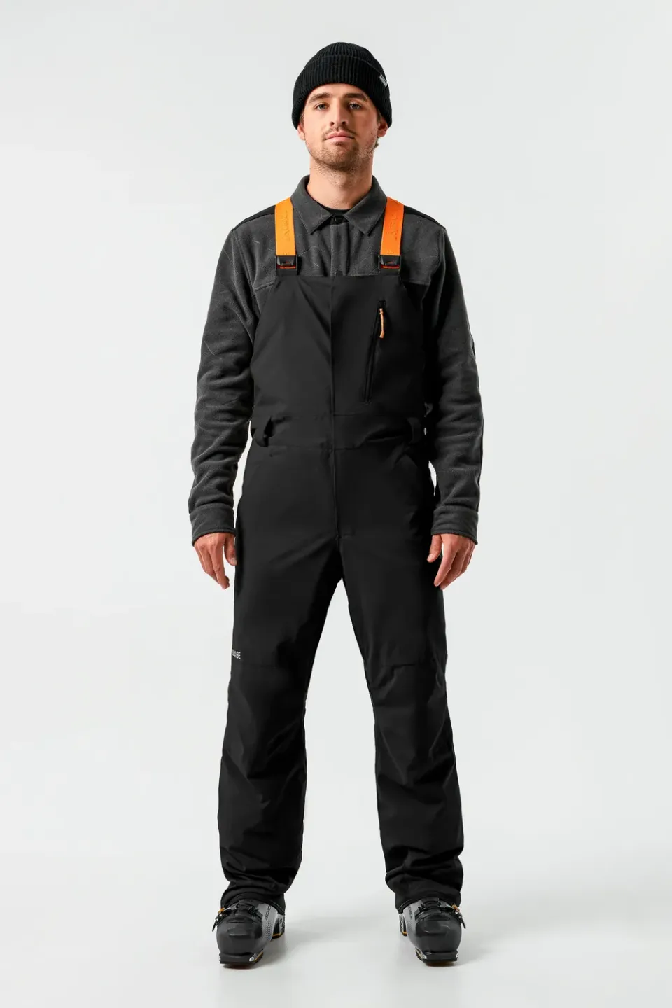 Orage Leeds salopette ski noire homme isolée