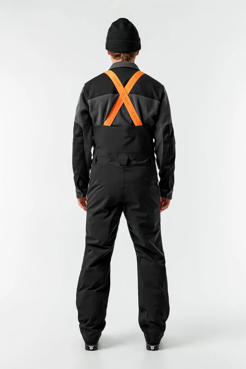 Orage Leeds salopette ski noire homme isolée
